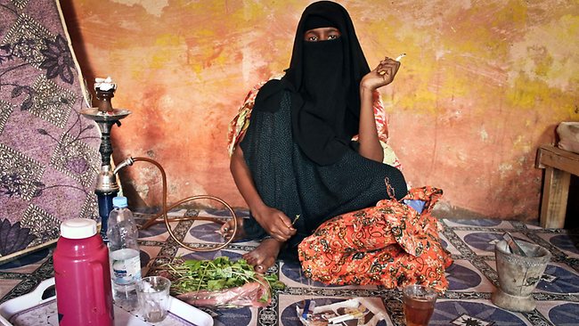 This Somali callgirl, also snapped by the AP team, reflects the problem of credit for pirates: no one is offering it to them. Not investors in pirate missions, not dealers in cars, whiskey or drugs, and not this callgirl. Her services she insists cost $1000 a night and she will only take cash. She may have been posturing a bit for the reporters, so as to use them to send word around town that she's not lowering her price and that she's worth every penny. But right now, we doubt she'll get many takers. Tea in Hobyo, which cost 50 cents a cup at the height of piracy in 2011, has drifted back down to just a nickle. So do the math on the callgirl. Everyone profits from piracy - from the callgirls, to the 4 wheel drive dealers, to the whiskey salesman and the khat merchant - as well as the clan elders who get their cut. Not to mention most importantly Somali young men who can make $10,000 to $15,000 in one successful mission. Compare that to making $600 a year on average otherwise. As long as so many people can benefit directly and indirectly from piracy through the monies it brings into the local economy, we believe that the threat will remain with us, ready to flair up as soon as lenders decide to front the pirates some money and send them off to sea again.