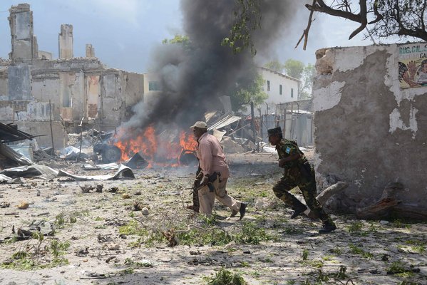 Despite all the encouraging news from Mogadishu since late 2012, al Shabaab, the al Aqaeda-affiliated Islamist insurgent group has not put down it arms. As it's been pushed out of major cities and towns, it has moved from conventional combat over to terrorist attacks and asssasinations. Here we see the authorities responding to an especially heinous and bloody attack on a courthouse, which involved almost a dozen attackers and which cost the lives of at least 20 innocent people.